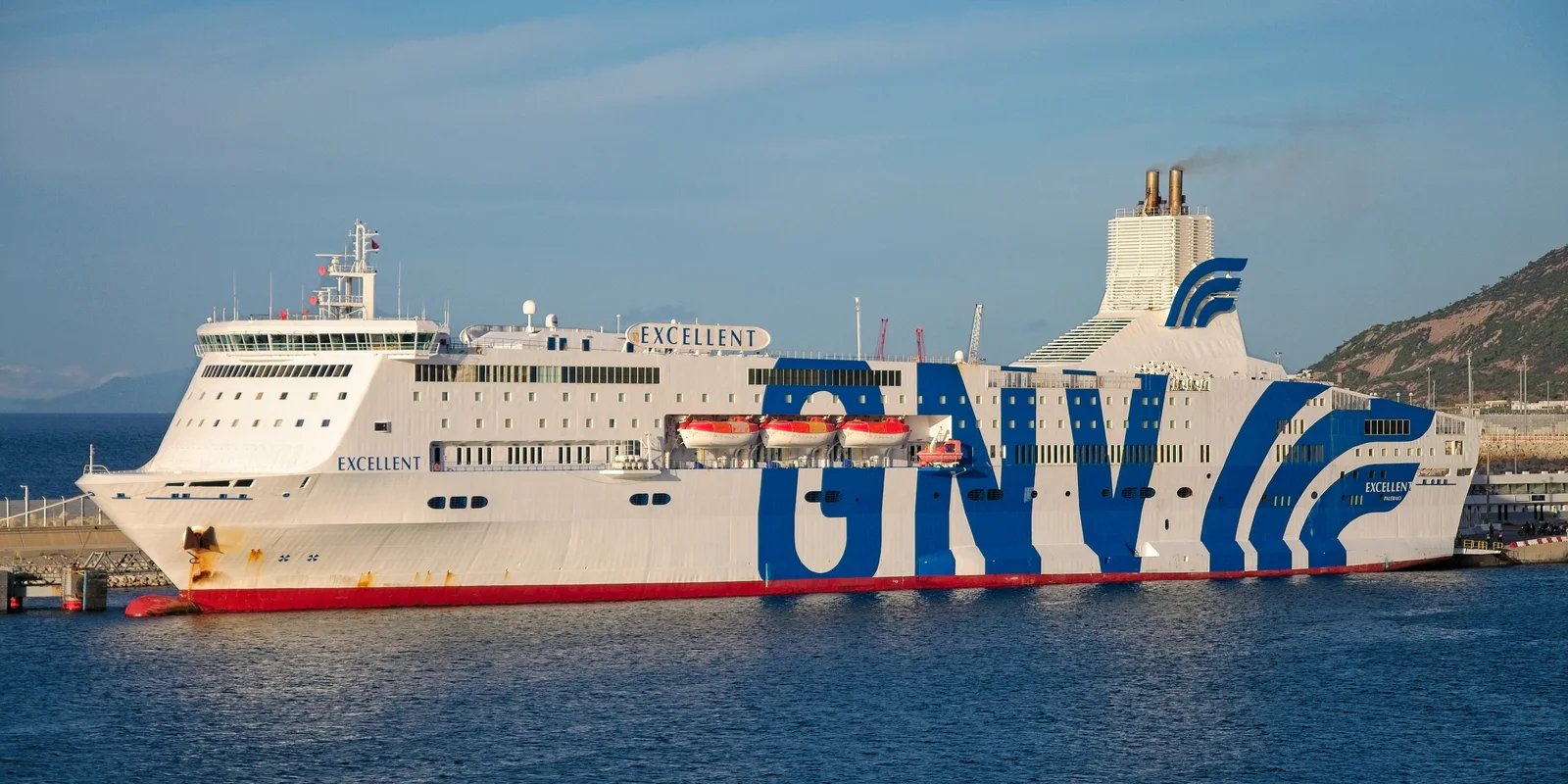 The white and blue GNV ferry Excellent moored at Tangier Med